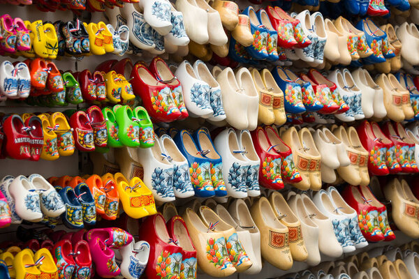 colorful authentic wooden Netherlands shoes selling on market