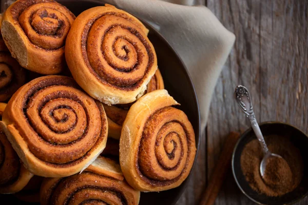 Fresh Baked Cinnamon Buns Dark Wooden Background — Stock Photo, Image