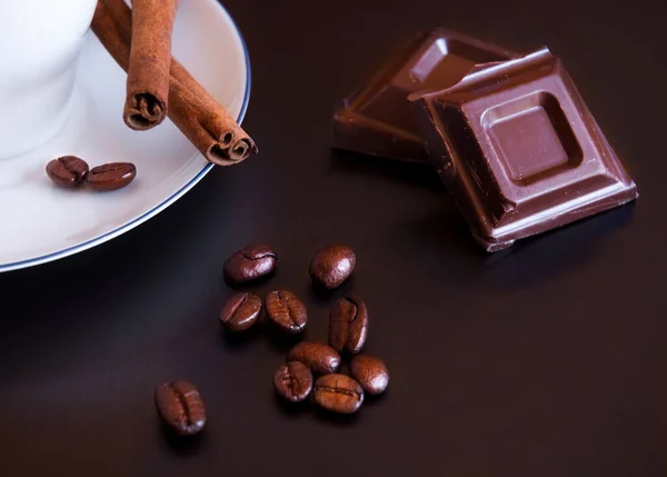 Coffee Beans Cinnamon Sticks Nuts Chocolate Dark Background — Stockfoto