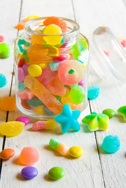 Colorful Candies Glass Jar Wooden Background — Stock Photo, Image
