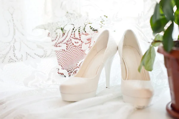 Shoes on a window sill. — Stock Photo, Image