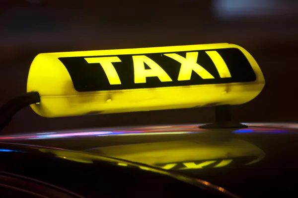 Señal de taxi amarillo Imagen de archivo