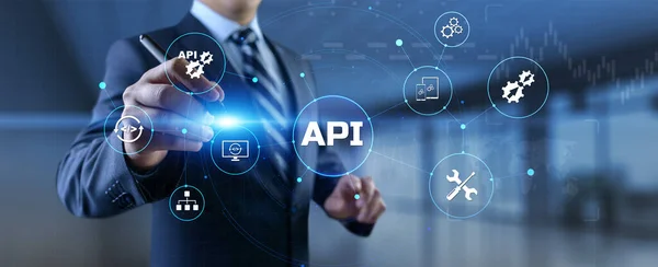 API Application programming interface. Businessman pressing virtual button. — Stock Photo, Image