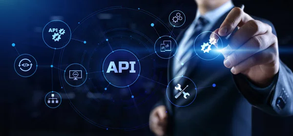 API Application programming interface. Businessman pressing virtual button. — Stock Photo, Image