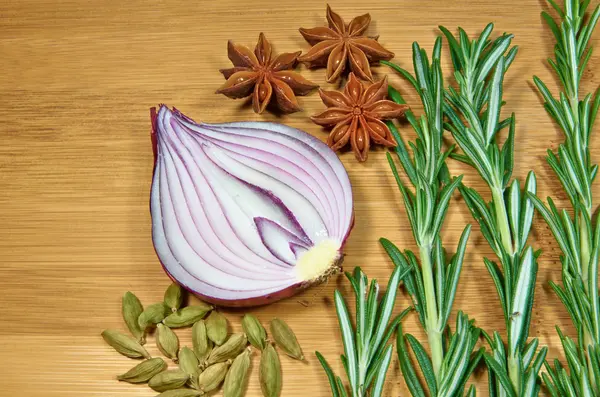 Onion with rosemary — Stock Photo, Image