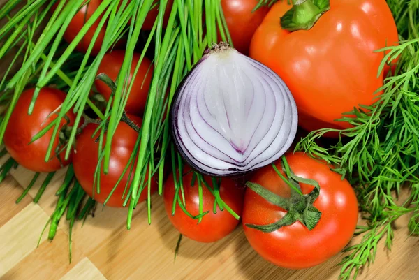 Sliced onion with vegetables — Stock Photo, Image