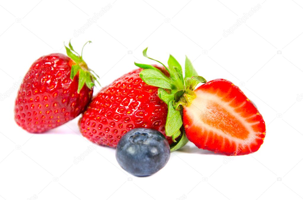 Sliced strawberry with bilberries
