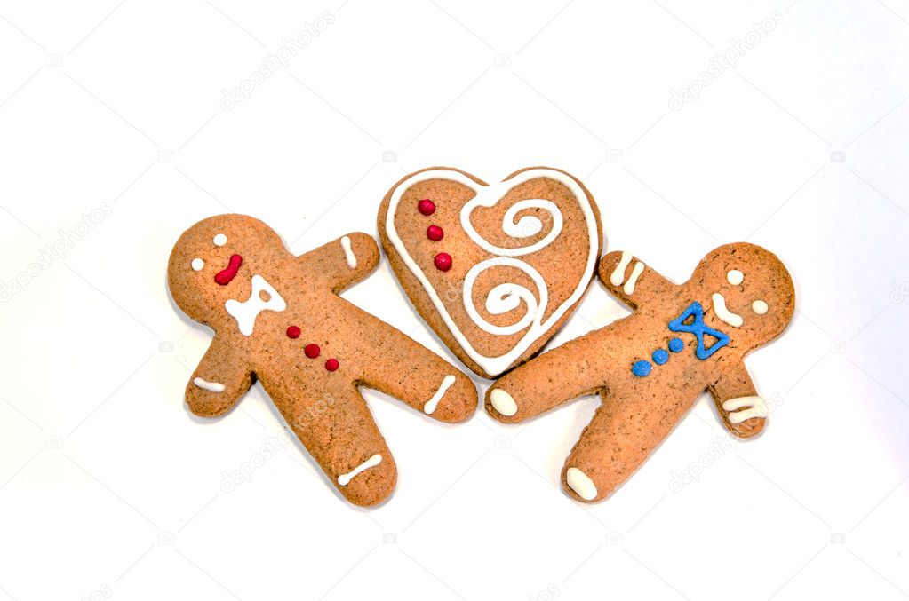 Two gingerbread men with a heart