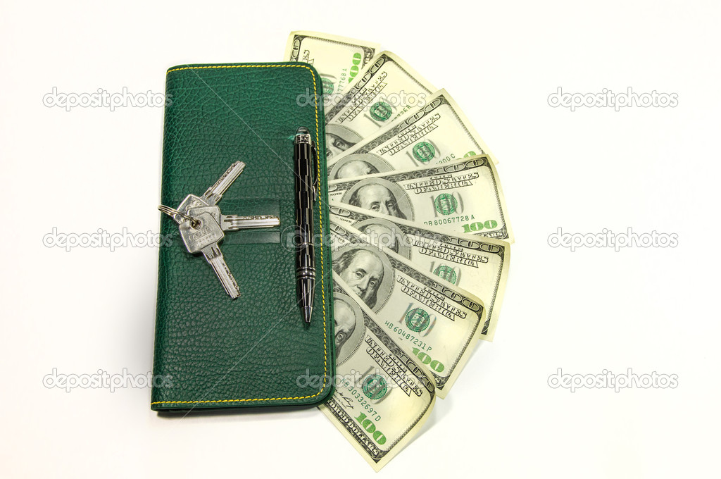 Wallet with dollar bills and keys isolated