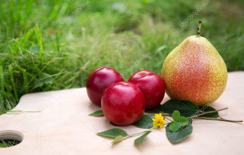 Three plums with pear