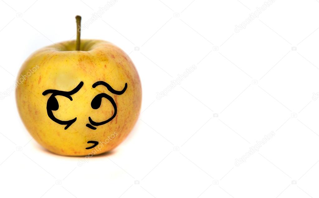 Cartoon-faced apple isolated on white