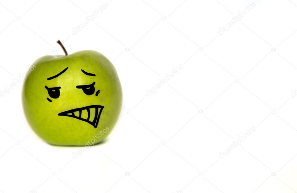 Cartoon-faced apple on white