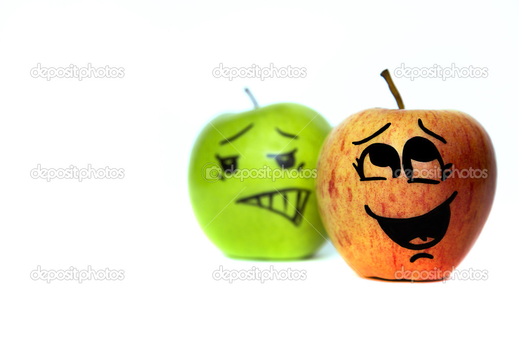 Two cartoon-faced apples isolated
