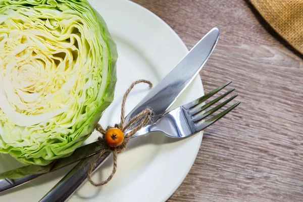 Cabbage on the white plate — Stock Photo, Image