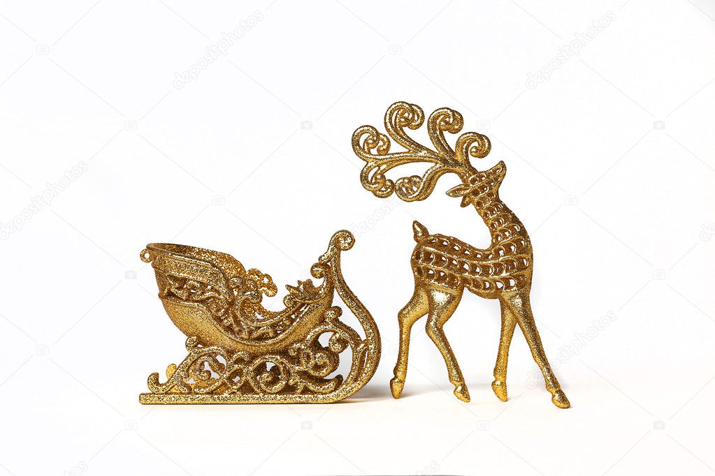 Christmas deer with gold sledge isolated on white