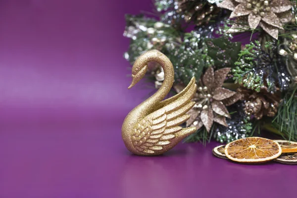 Christmas decoration as a gold swan — Stock Photo, Image