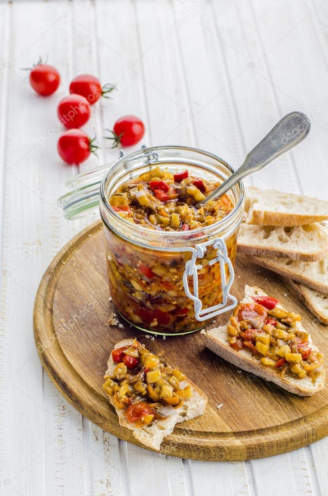 Eggplant caviar in a glass jar — Stock Photo © Gorobina 32523807