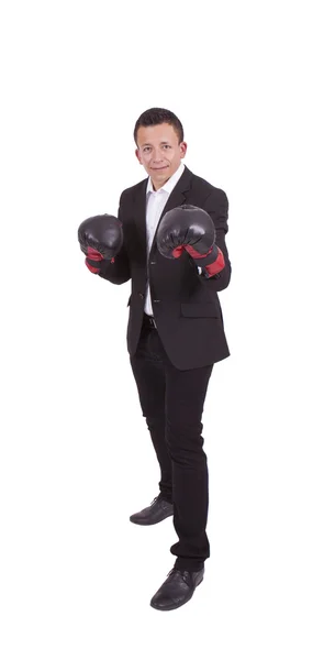 Businessman with boxing gloves ready to fight — Stock Photo, Image