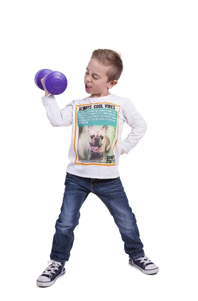 Élémentaire garçon exercice avec haltère — Photo