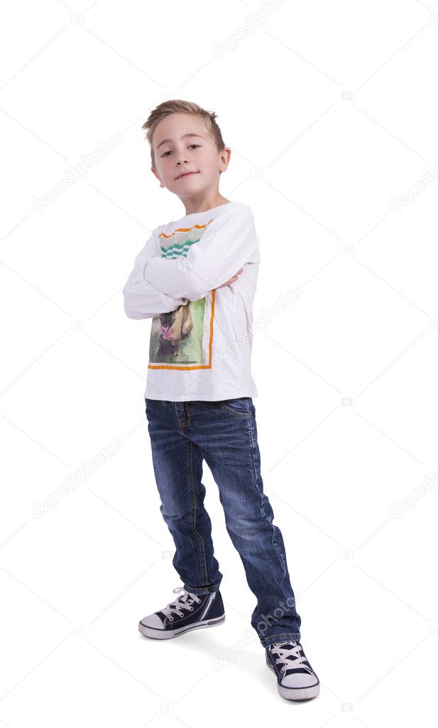 Cute elementary boy with arms crossed