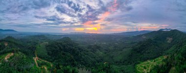 Aerial and panorama view over top of Khao Kai Nui in Phangnga province of Thailand show evening light and golden hour near Andaman bay with beautiful landscapt of sounthern part of Thailand.