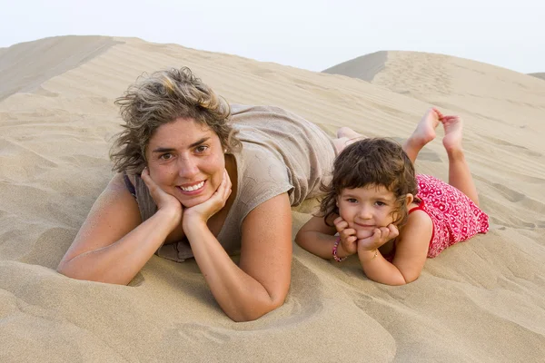 Woman and daughter in dunes — Stock Photo, Image