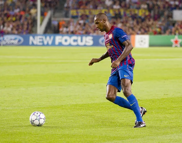 Eric Abidal en acción — Foto de Stock