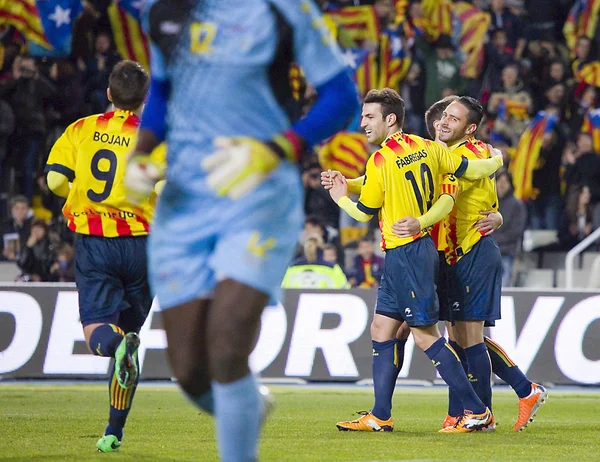 Jugadores catalanes celebrando un gol Imagen de archivo