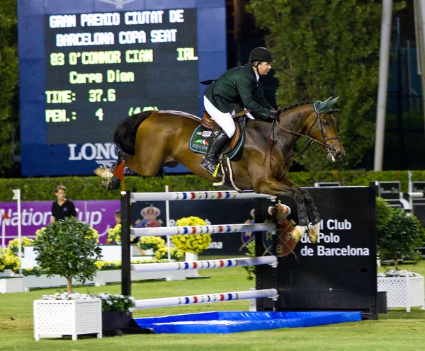 Horse jumping - Cian O'Connor Royalty Free Stock Photos