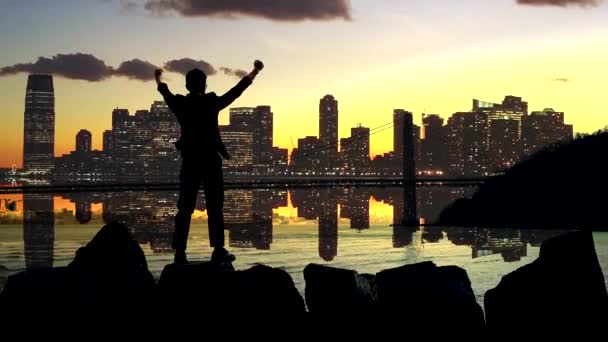 Silhouette Businessman Raising Hands — Stock Video