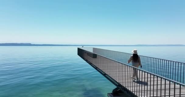 Aerial Video Happy Carefree Woman Standing Pier Looking Sea — Stockvideo