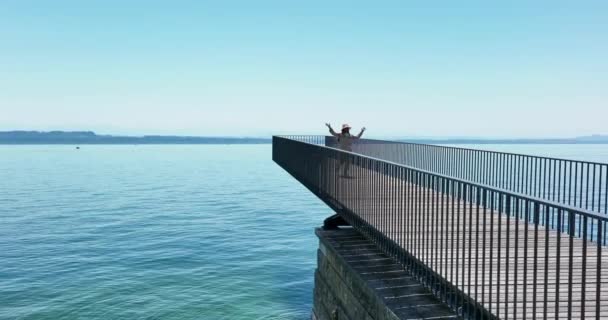 Aerial Video Happy Carefree Woman Standing Pier Looking Sea — Stockvideo