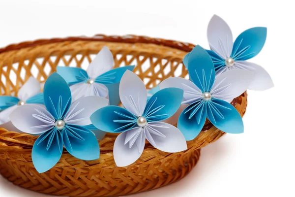 Paper flowers in a basket — Stock Photo, Image