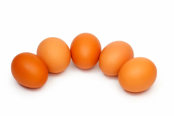 Five eggs on a white background — Stock Photo, Image