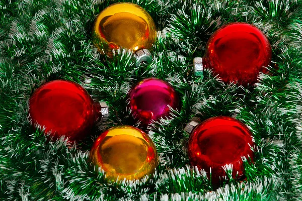 Christmas wreath of tinsel and balls as a texture — Stock Photo, Image