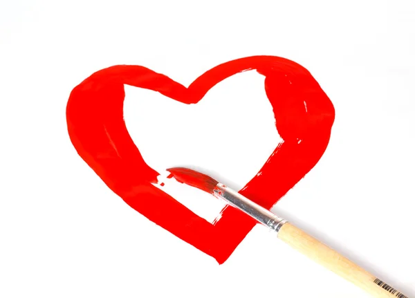 Kalp kırmızı boya ile çizilen fırça şekli — Stok fotoğraf