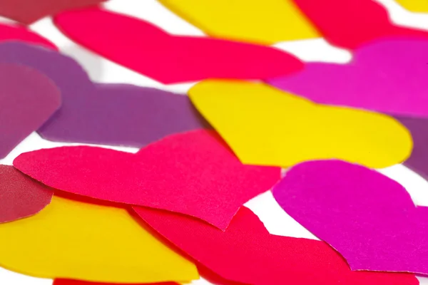 Viele papierfarbene Herzformen — Stockfoto