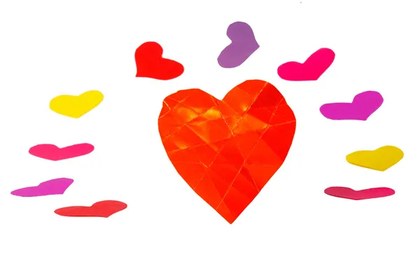 Ένα σχήμα καρδιάς πορτοκάλι χαρτί με roundelay από χρωματιστό καρδιά σχήματα — Φωτογραφία Αρχείου