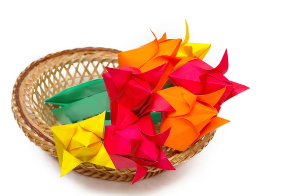 Many colored paper tulips in a basket — Stock Photo, Image