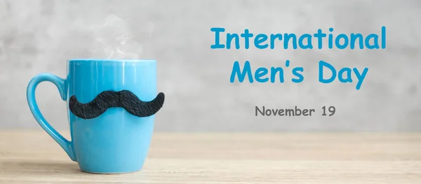 Internationaler Männertag Mit Blauer Kaffeetasse Oder Teetasse Und Schwarzem Schnurrbart — Stockfoto