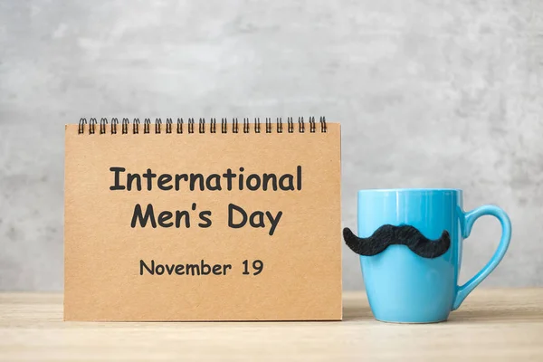 Internationaler Männertag Mit Papierblock Blauer Kaffeetasse Oder Teetasse Und Schwarzem — Stockfoto