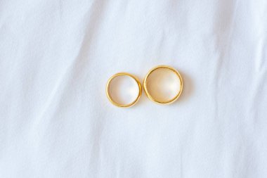 couple golden engagement ring on white background. Love, together and Happy Valentines day concept