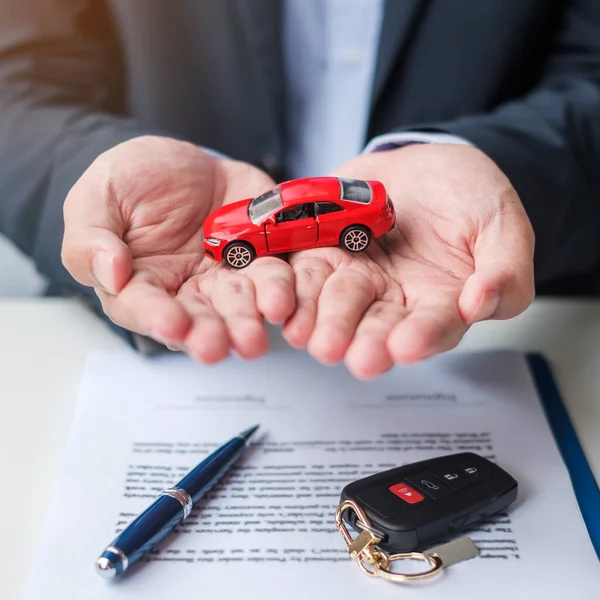 Businessman Hand Holding Red Car Toy Vehicle Keyless Pen Contract — Stock Photo, Image