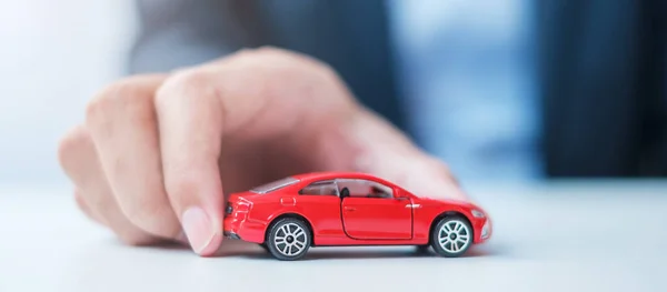 Businessman Hand Holding Red Car Toy Car Insurance Warranty Rental — Stock Photo, Image