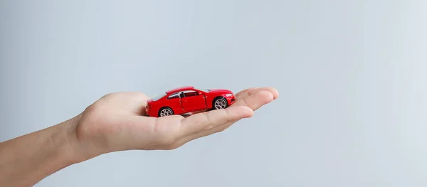 Businessman Hand Holding Red Car Toy Car Insurance Warranty Rental — Stock Photo, Image