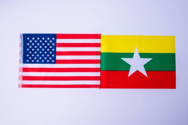 Amerika Birleşik Devletleri Myanmar bayraklarına karşı. Yaptırımlar, savaş, çatışma, politika ve ilişki kavramı