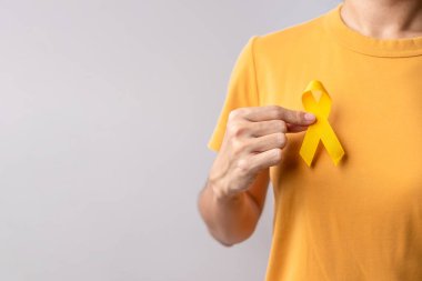Yellow September, Suicide prevention day, Childhood, Sarcoma, bone and bladder cancer Awareness month, Yellow Ribbon for supporting people life and illness. Healthcare and World cancer day concept