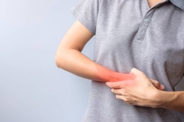woman holding her wrist pain because using smartphone or computer long time. De Quervain s tenosynovitis, Intersection Symptom, Carpal Tunnel Syndrome or Office syndrome concept
