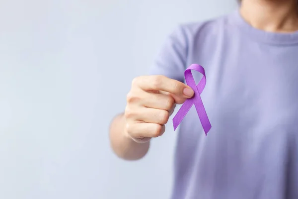 purple Ribbon for Violence, Pancreatic, Esophageal, Testicular cancer, Alzheimer, epilepsy, lupus, Sarcoidosis and Fibromyalgia. Awareness month and World cancer day concept