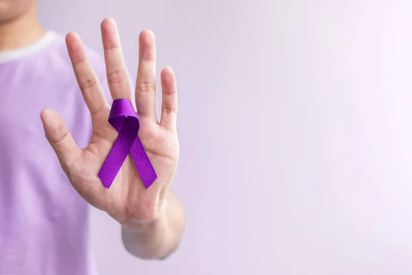 purple Ribbon for Violence, Pancreatic, Esophageal, Testicular cancer, Alzheimer, epilepsy, lupus, Sarcoidosis and Fibromyalgia. Awareness month and World cancer day concept